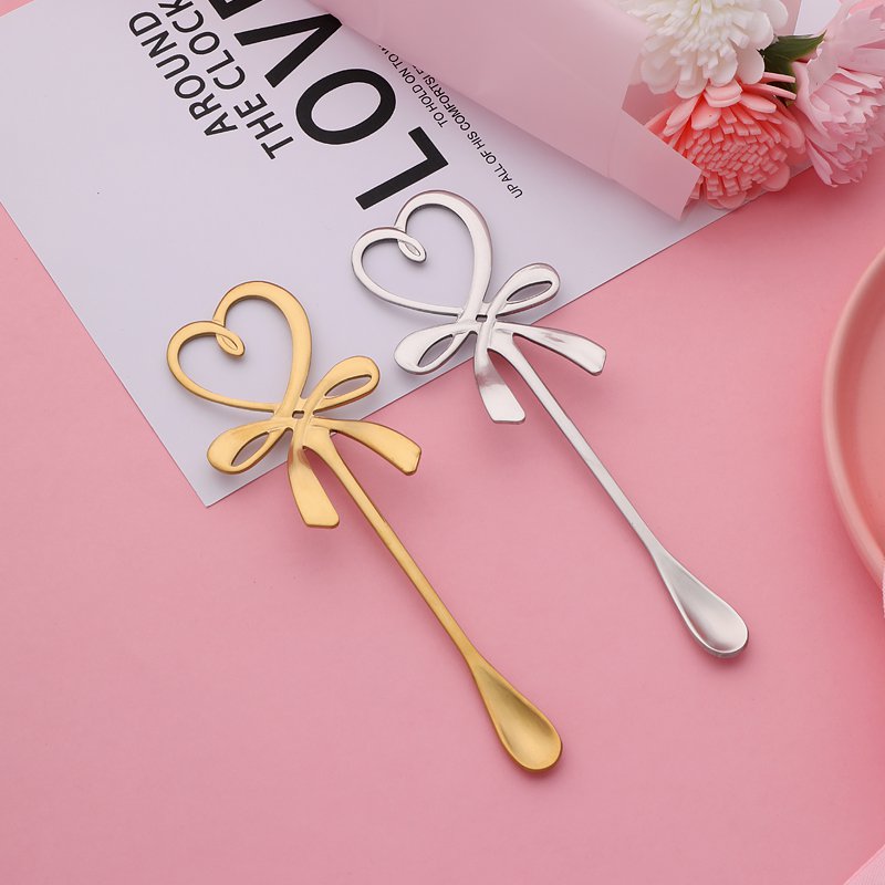 Silver core spoons - lots of 2