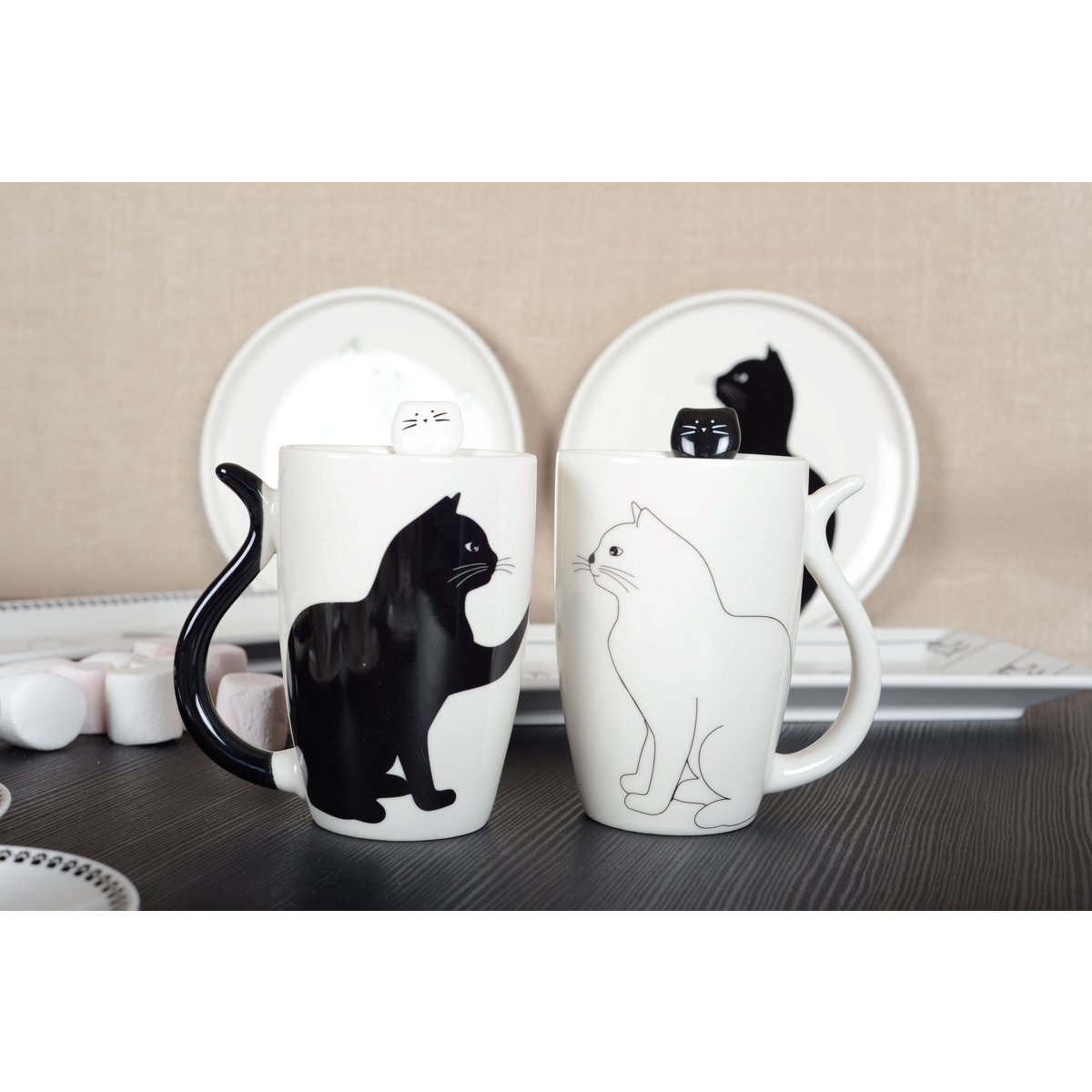 BLACK AND WHITE CAT CUPS WITH TAIL-SHAPED HANDLE – SET OF 2